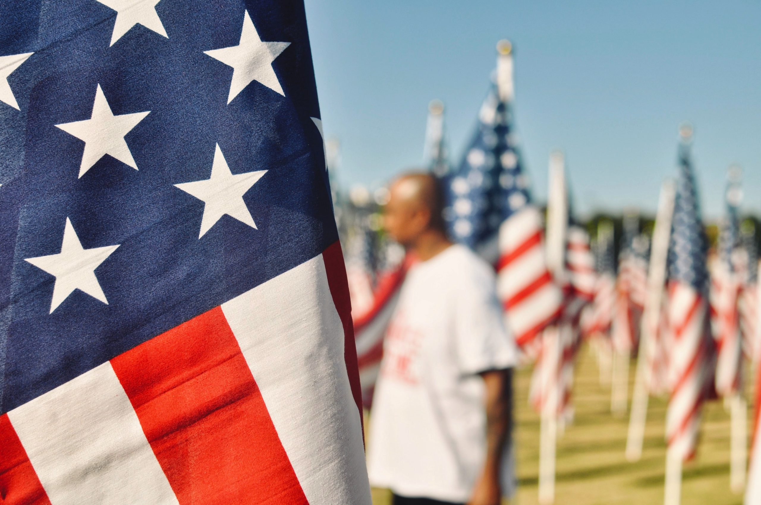 Man Standing in Military Memorial